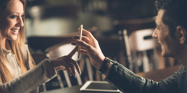 Couple On Date With Phone