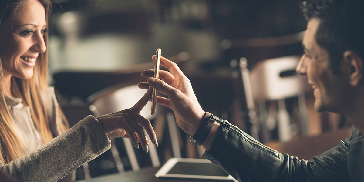 Couple On Date With Phone